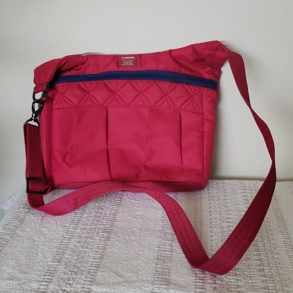 Lug 'swing' crossbody bag, hot pink, 3 sectioned pockets.